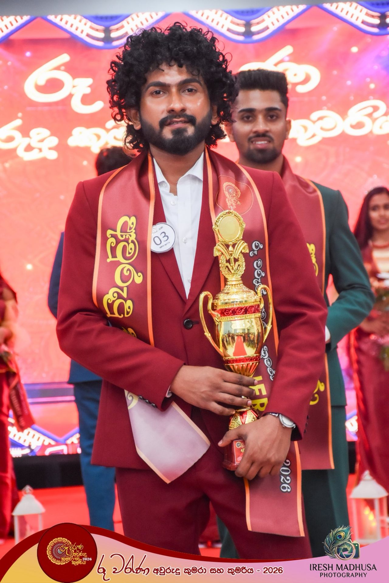 Male winner with trophy